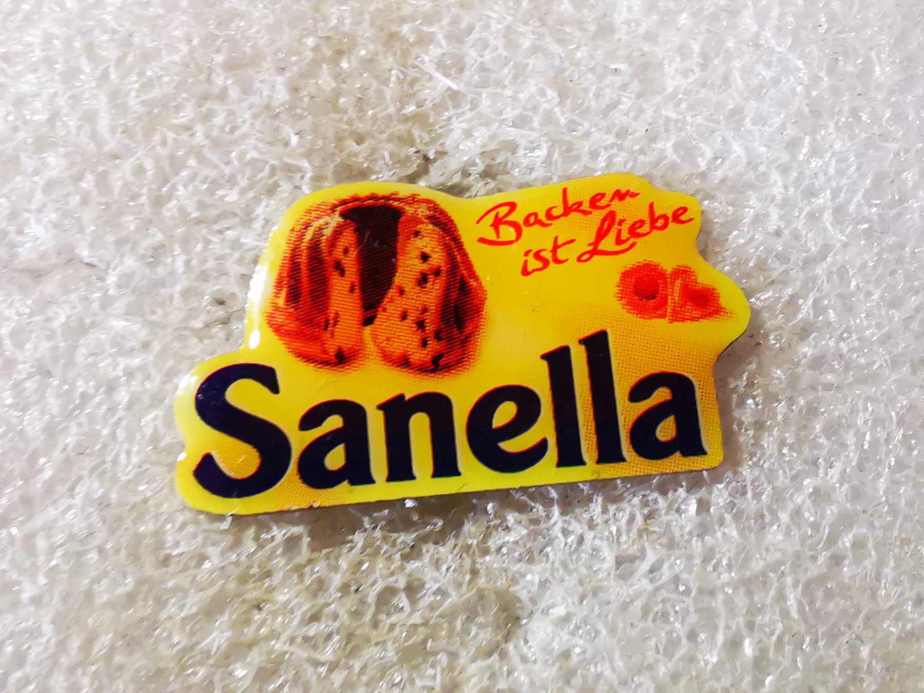 Placchette & Badge: Ansteckpin 96: Sanella – Usato da Oppligen venduto da Pin-Fall-Shop