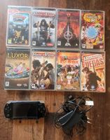 Sony PSP 2004 + 8 jeux + chargeur + Memory Stick 2 Go