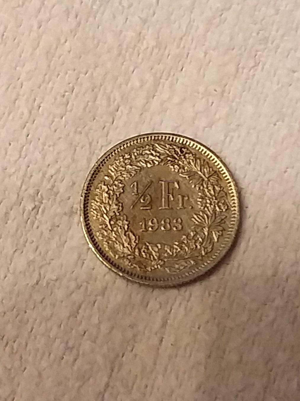 Toutes les monnaies: Pièce rare ½ Franc Suisse 1983 – D'occasion à La Chaux-de-Fonds par Marteaux