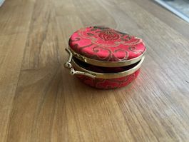 Red jewellery box with mirror and clasp closure
