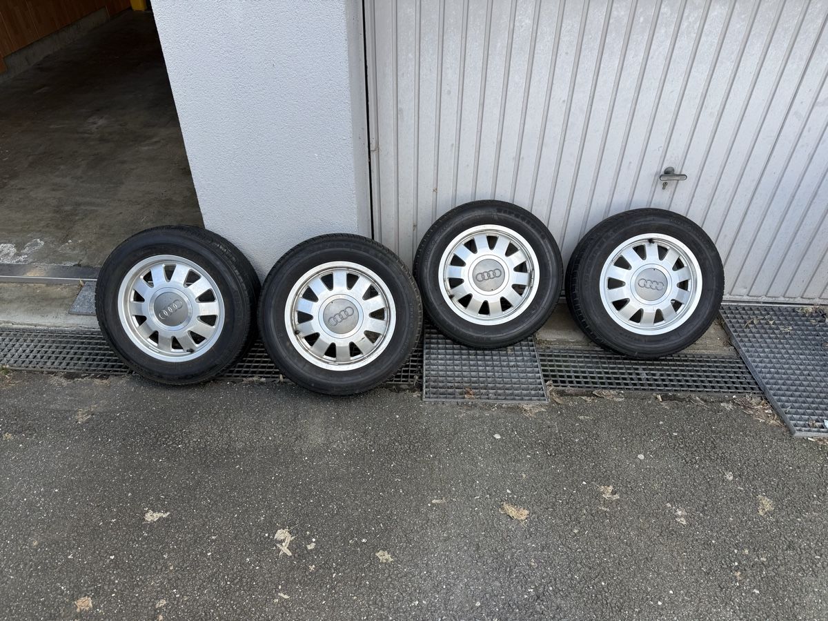 Pneus & Kompletträder: Jantes Audi avec pneus 195/65 R15 très vieux. – Gebraucht aus Cheseaux-Lausanne von davidleal1989