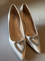 Scarpe bianche con cuore