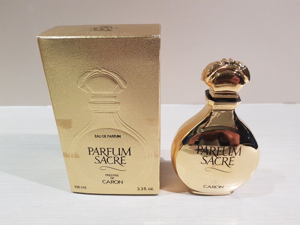 Pin's Collector CARON 'Parfum Sacré' En Acier Inoxydable Doré - Édition Limitée, Neuf Sans Emballage