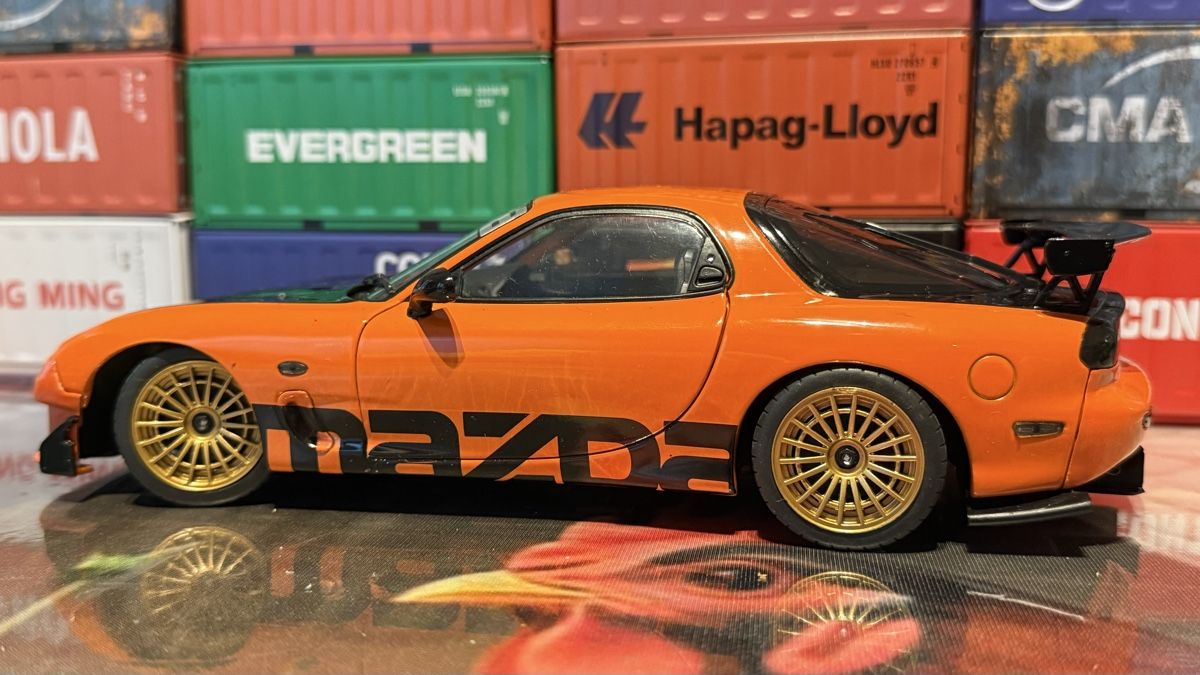 Mazda Modellautos: Mazda RX-7 orange – Neu (gemäss Beschreibung) aus Basel von Zomeg