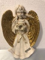 Figurine ange avec bougeoir en céramique