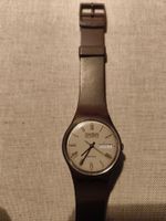 Swatch Quartz Swiss braun 883 mit cristallina Werbung alt