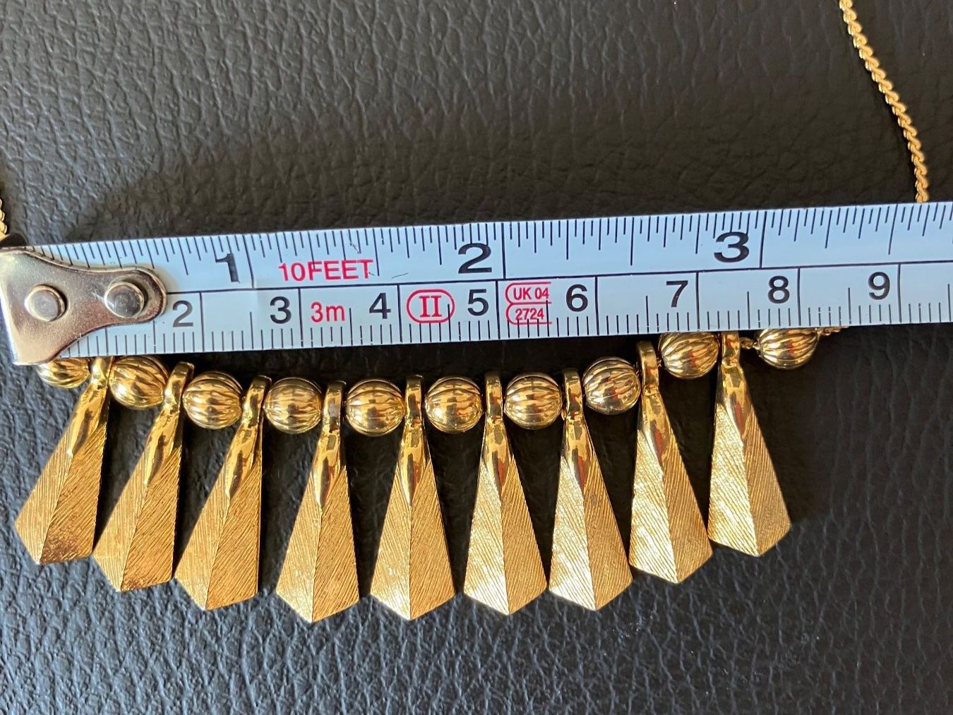 Catenine: Collier vintage doré à franges – Usato da Peseux venduto da Cresus27 3