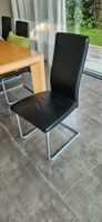 8 Freischwinger Lederstühle schwarz