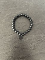 Armband mit Scheibenanhänger schwarz matt neu 7cm Durchmesse