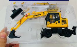 Komatsu PW148-10 mit Standard Grabenreinigungsschaufel 1/50