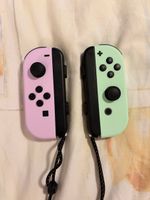 Nintendo Switch JoyCons in grün/rosa