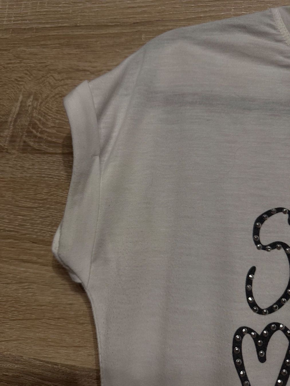 T-shirt: T-shirt blanc – Usato da Montreux venduto da Izapechee 2