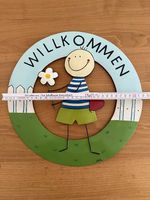 Türschild von Mila
