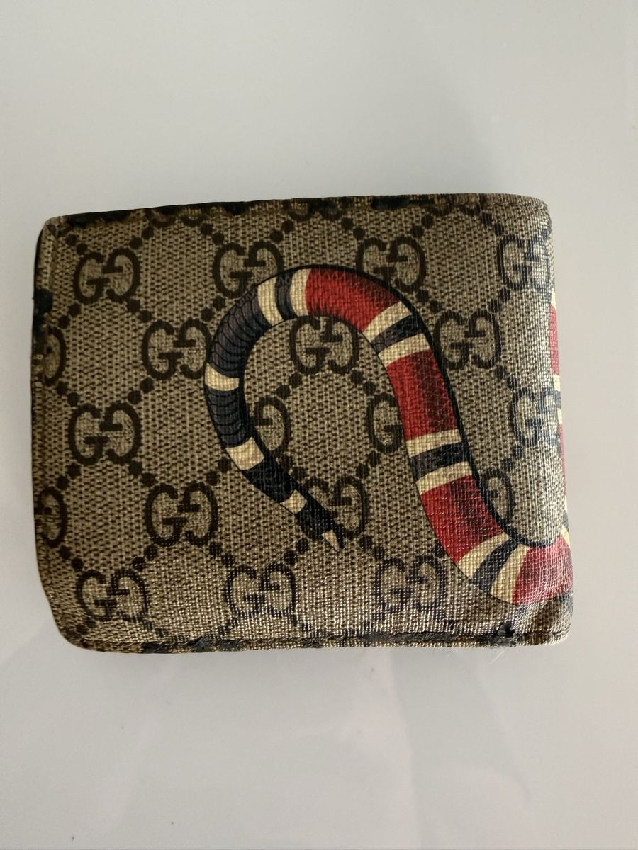 Gucci Portefeuilles: Gucci Brieftasche Schlangenmuster gebraucht – D'occasion à Meggen par boj_k8t5 1