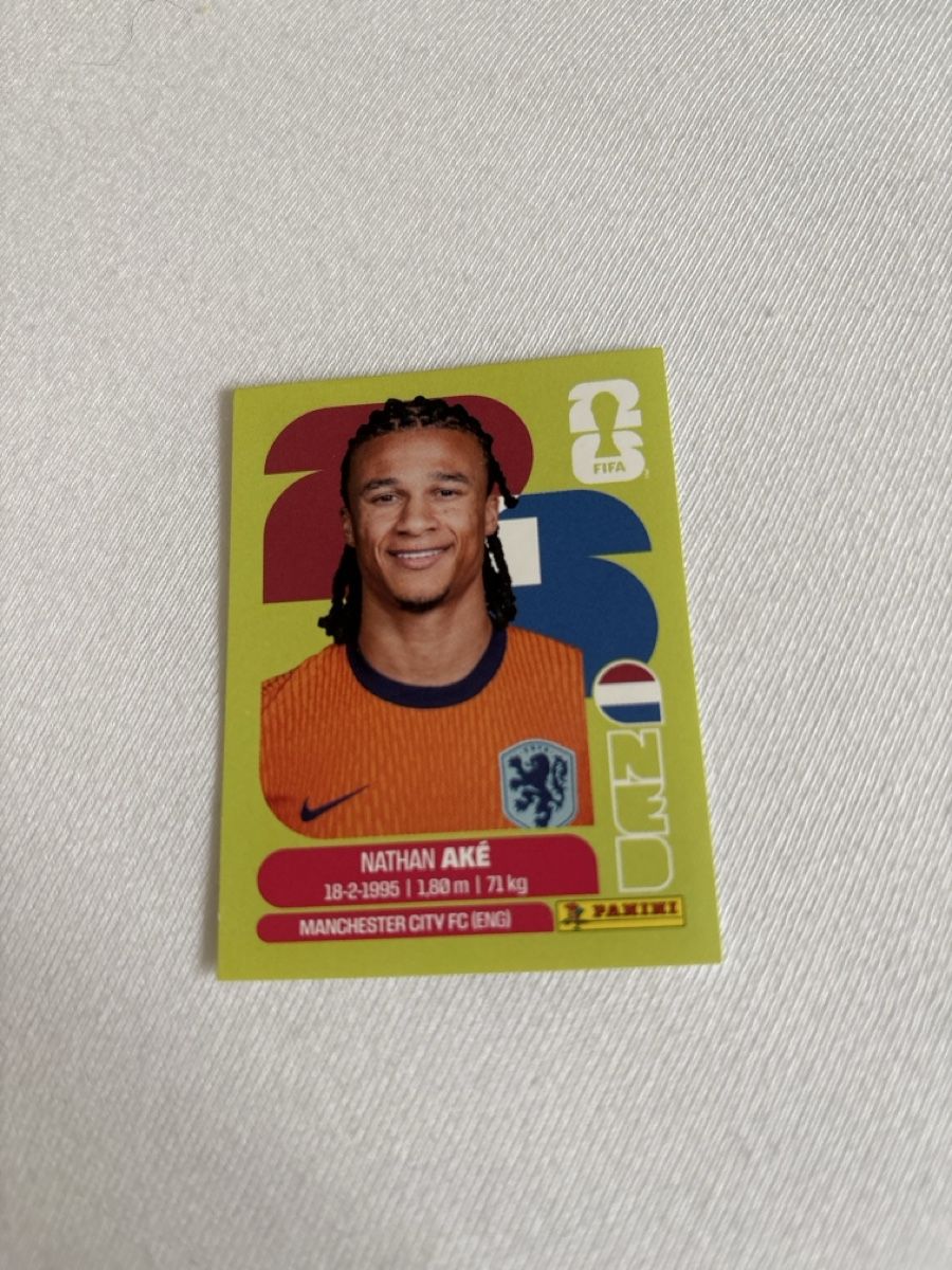 Panini Carte collezionabili: Panini Sticker WM 2026 Nathan Aké NED 7 – Nuovo (secondo la descrizione) da Suhr venduto da Aylou
