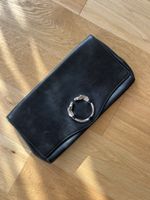 Pochette Gucci en cuir noir