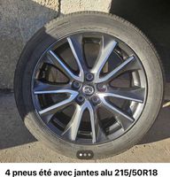 4 pneus été sur jantes alu casi neuf 215/50R18