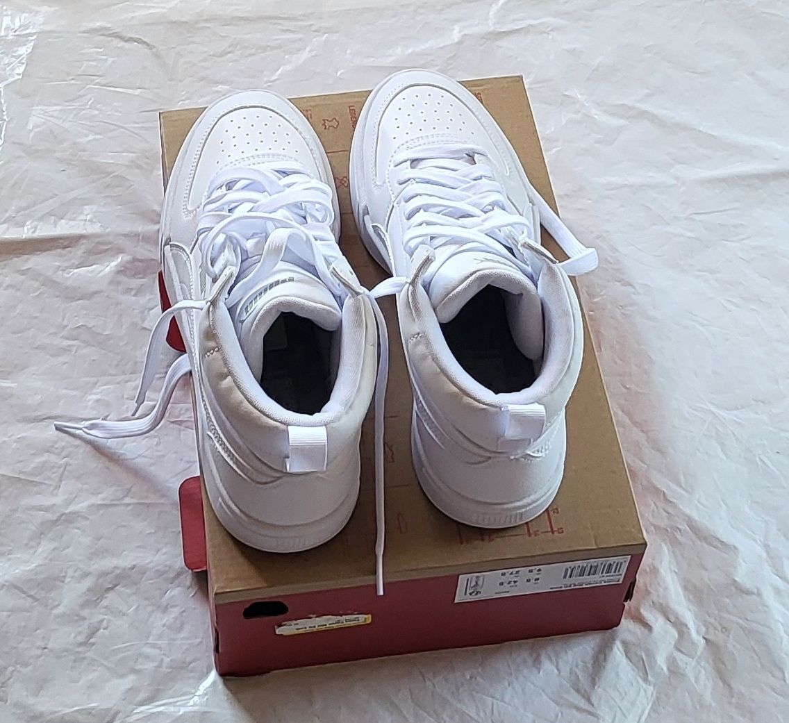 Puma Scarpe da uomo: Puma Caven Mid, blanches, taille 42.5, état  neuf – Nuovo (secondo la descrizione) da Niedergösgen venduto da Eva2410 1