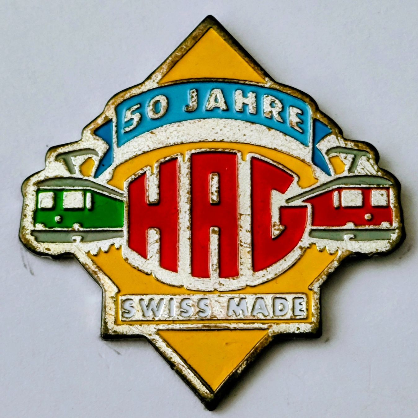 Plaketten & Abzeichen: Pin HAG Modelleisenbahn – Gebraucht aus Pfäffikon ZH von Colacity