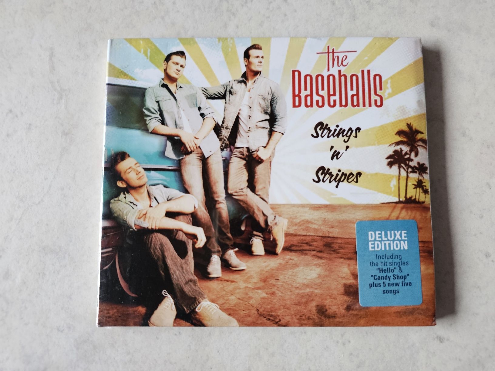 CD: Baseballs  -  Strings 'n' Stripes  /  Deluxe Edt. Fabrikneu – Nuovo e nell'imballaggio originale da Schneisingen venduto da backstore24