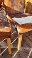 Lot de 2 chaises style chalet – peau de vache véritable