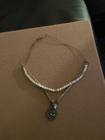 Collier tour de cou réglable perles rosescuir
