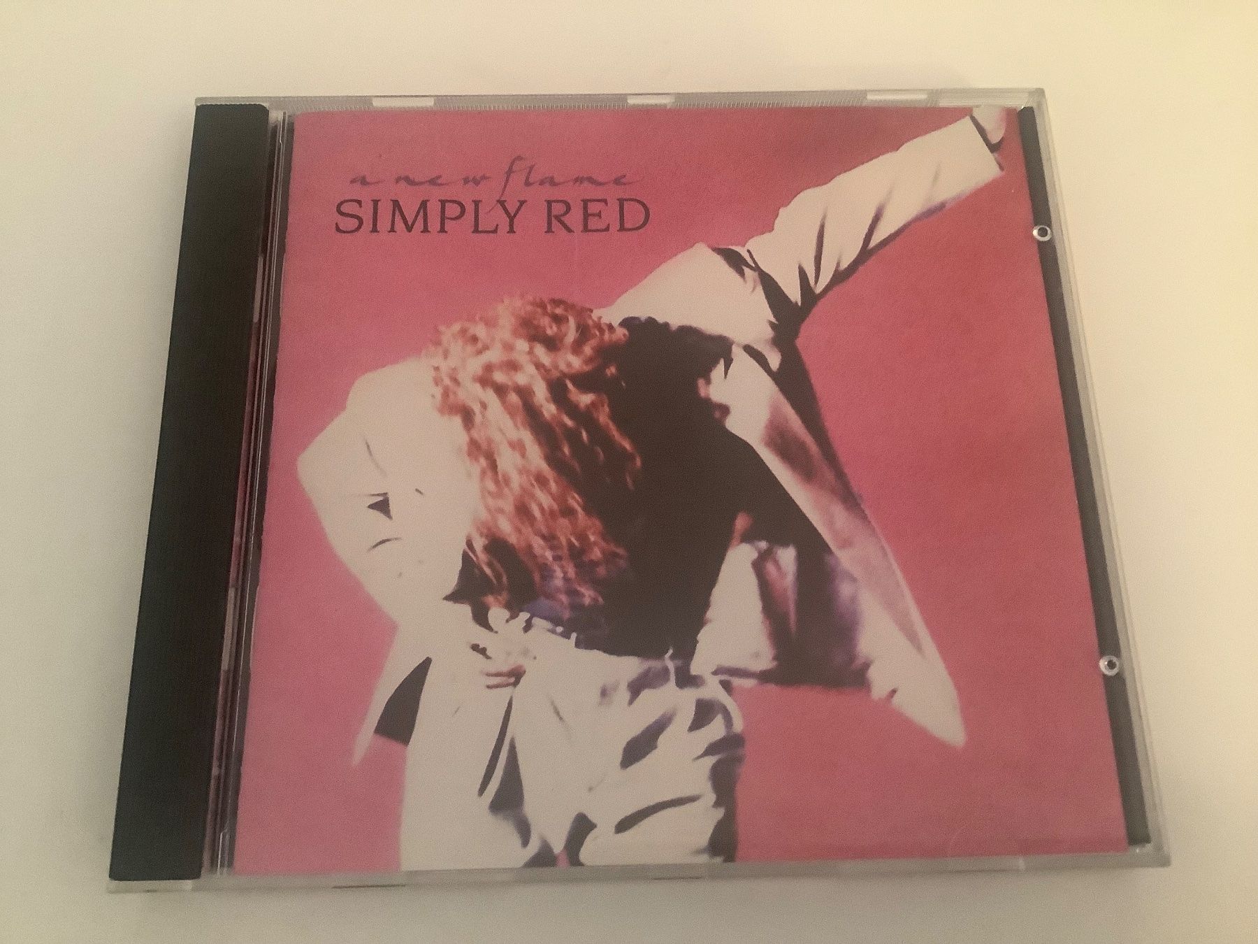 CD: Simply Red / a new flame / 1989 – Usato da Dübendorf venduto da Troll_88