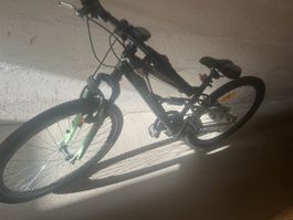 VTT tout suspendu en bon état, idéal pour l'été!