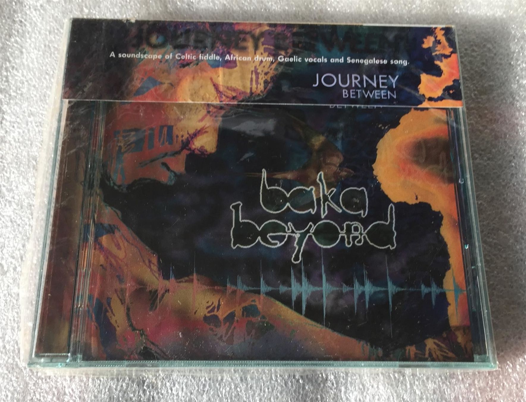 CD: Baka Beyond "Journey Between" Ethno Fusion Orig 1998 New CD – Nuovo e nell'imballaggio originale da Genève venduto da Cockattoo