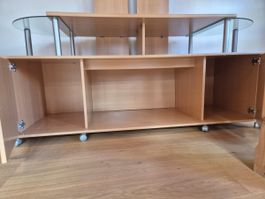 TV-Möbel Holzoptik mit Glasregalen und Rollen gebraucht