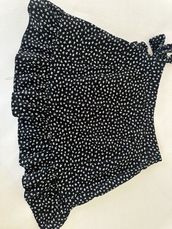 Ruffled black mini skirt