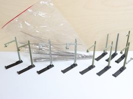 Märklin Oberleitung viele Guss Masten 407M & Fahrdraht H0