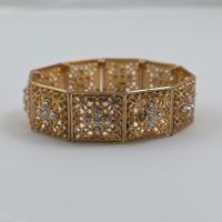 Elegantes goldenes Armband mit Strass -203