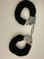 Manette peluche nere