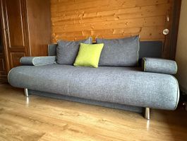 Canapé-lit en tissu gris chiné