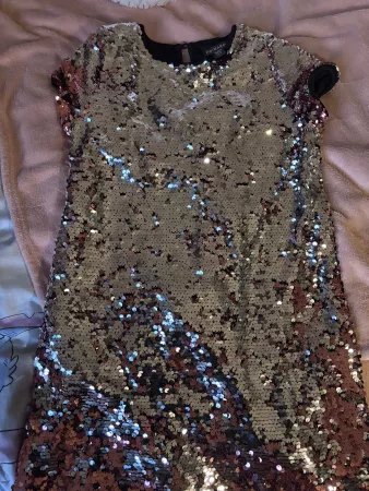 Kleid Pailletten Grösse 164cm guter Zustand