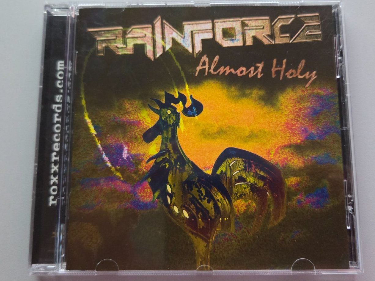 CD: CD Rainforce - Album Almost Holy – Usato da Schaffhausen venduto da Kellerrassel