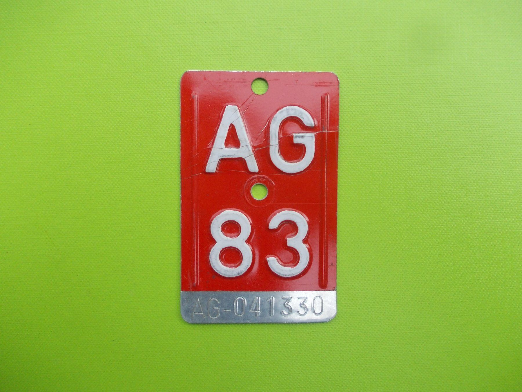 Insegne: Velonummer / Fahrradnummer AG 83 – Usato da Gsteigwiler venduto da HORMIGA21