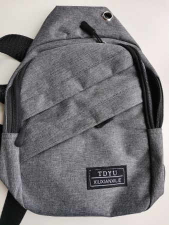 kleiner Rucksack m. Diagonalträger/ versch. Fächer/ NEU !