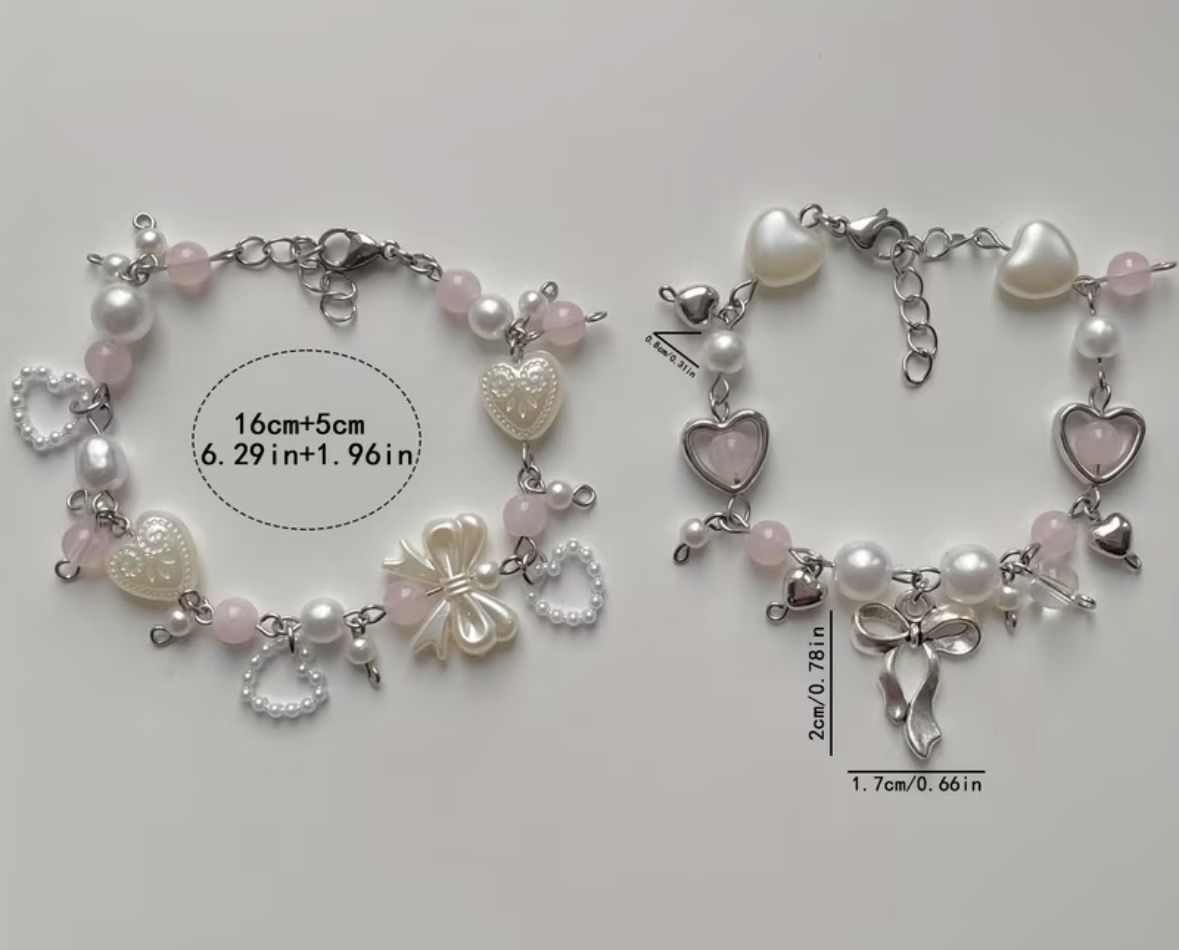 Bracelets: Armband mit Perlen und Herzen pink silberfarben – Neuf avec emballage d'origine à Ostermundigen par Marlise68