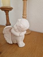 Engel schlafend/sitzend/geborgen