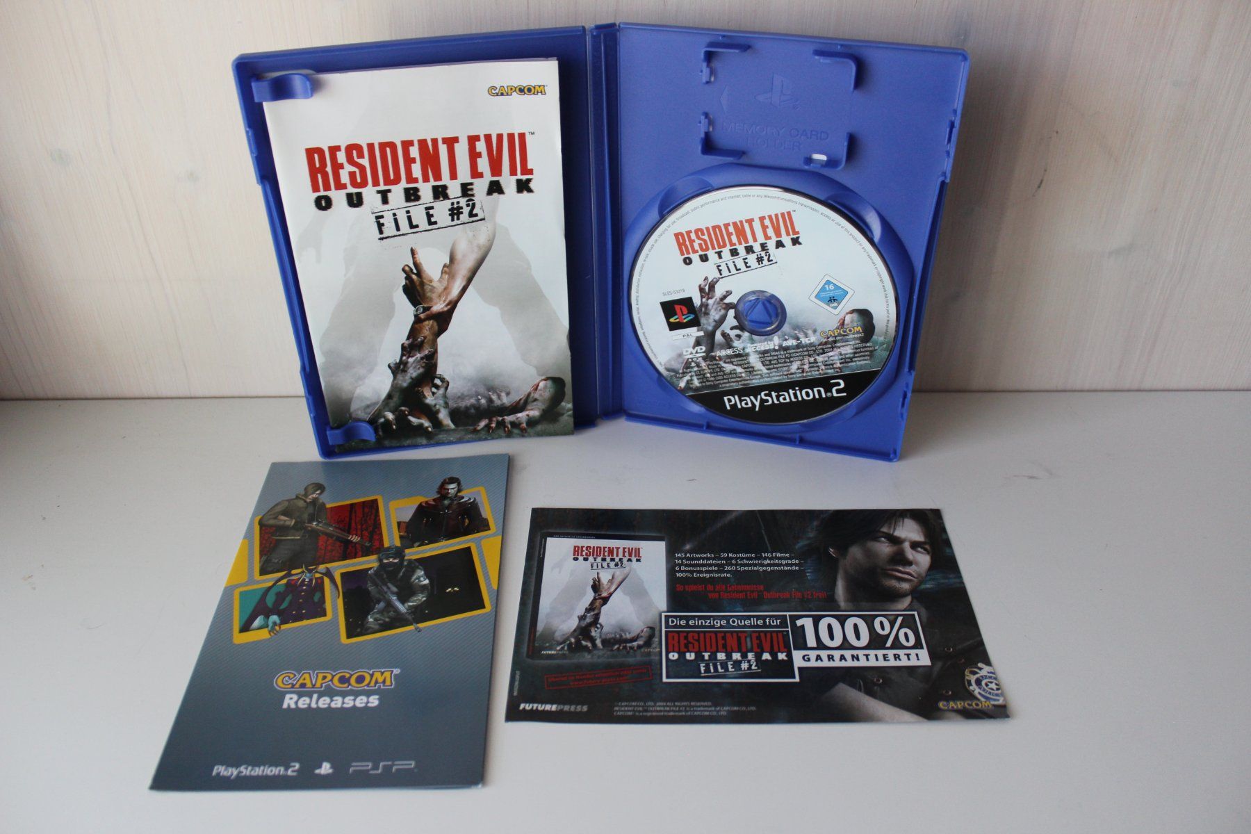 Jeux: Resident Evil Outbreak File 2 - PS2 / PlayStation 2 – D'occasion à Ebertswil par Ricogoeritz 2