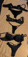 Drei Damen Dessous Sets in Schwarz 