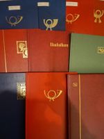 Leere Briefmarkenalben mit teils Dubletten / Massenware 