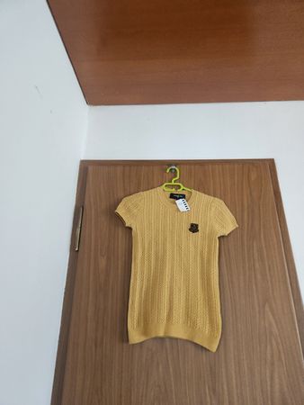 Pull Paule Ka jaune sans manches taille S état neuf