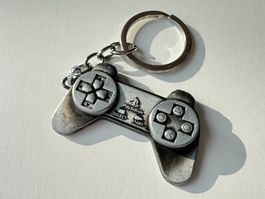 Porte-clé manette Playstation avec logo Nintendo