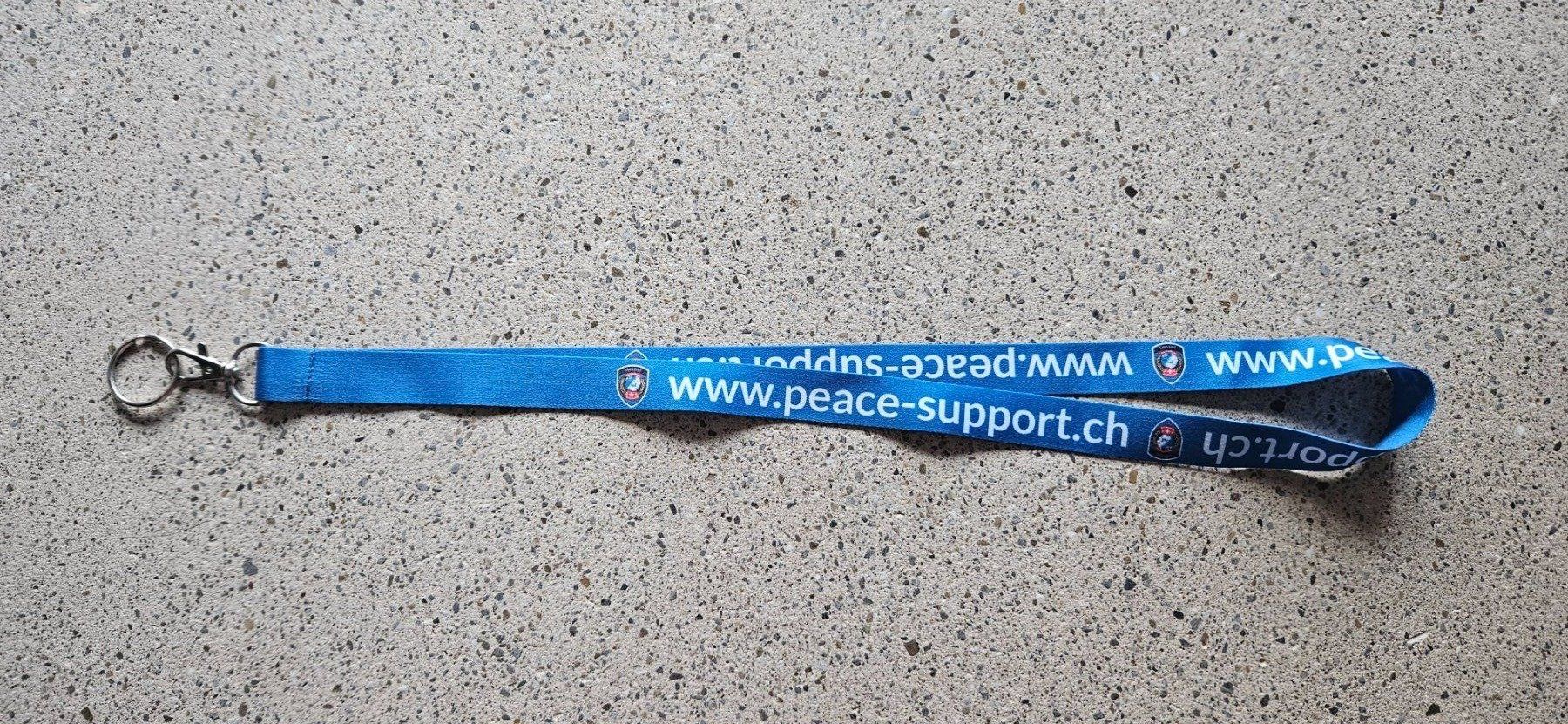 Schweizer Armee Placchette & Badge: *** Schlüsselanhänger Peace Support Schweiz *** – Nuovo e nell'imballaggio originale da Riedholz venduto da fr_sIruP