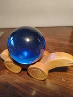 Holzschnecke Spielzeug mit blauer Glaskugel 7cm
