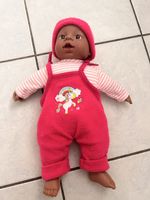 Adorable poupée bébé reborn avec tenue d'hiver rose