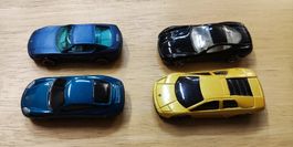 4 macchinine Ferrari Lamborghini Porsche